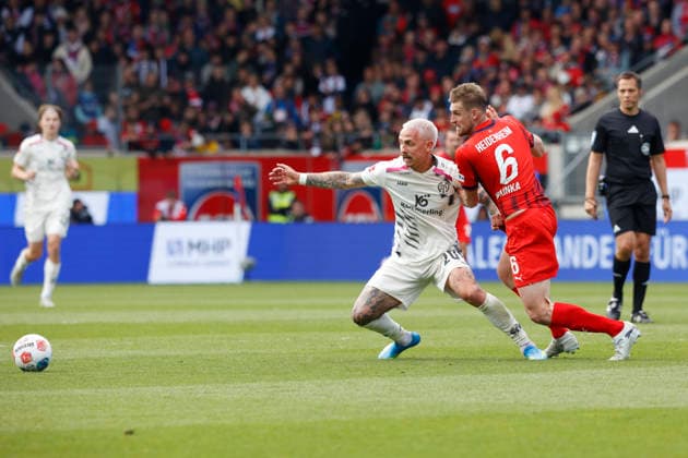Fussball, 1. Bundesliga, 34. Spieltag, 2025 2026, 1. FC Heidenheim vs. 1. FSV Mainz 05, 16.05.2026, Voith-Arena, Heidenheim, Deutschland, Phillipp TIETZ 1. FSV Mainz 05 20 li. im Zweikampf mit Patrick MAINKA 1. FC Heidenheim 6 Heidenheim Voith-Arena Baden-Württemberg Deutschland Copyright: xGaetanoxDixRosax