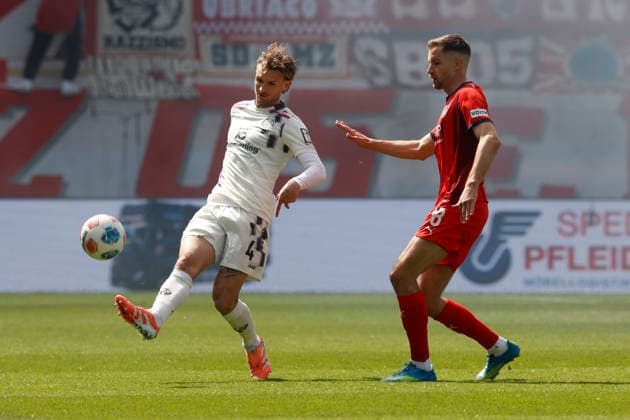 Fussball, 1. Bundesliga, 34. Spieltag, 2025 2026, 1. FC Heidenheim vs. 1. FSV Mainz 05, 16.05.2026, Voith-Arena, Heidenheim, Deutschland, Stefan POSCH 1. FSV Mainz 05 4 li. im Zweikampf mit Marvin PIERINGER 1. FC Heidenheim 18 Heidenheim Voith-Arena Baden-Württemberg Deutschland Copyright: xGaetanoxDixRosax