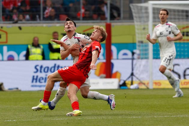Fussball, 1. Bundesliga, 34. Spieltag, 2025 2026, 1. FC Heidenheim vs. 1. FSV Mainz 05, 16.05.2026, Voith-Arena, Heidenheim, Deutschland, Paul NEBEL 1. FSV Mainz 05 8 li. im Zweikampf mit Hennes BEHRENS 1. FC Heidenheim 26 Heidenheim Voith-Arena Baden-Württemberg Deutschland Copyright: xGaetanoxDixRosax