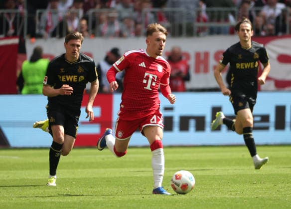 15.05.2026, 1. Bundesliga, 34.Spieltag, FC Bayern vs 1.FC Koeln, Allianz Arena Muenchen, Fussball, im Bild: Jakub Kaminski (1.FC Koeln), Lennart Karl (FC Bayern Muenchen), Alessio Castro Montes (1.FC Koeln)