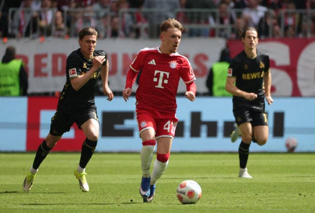 15.05.2026, 1. Bundesliga, 34.Spieltag, FC Bayern vs 1.FC Koeln, Allianz Arena Muenchen, Fussball, im Bild: Alessio Castro Montes (1.FC Koeln) vs Lennart Karl (FC Bayern Muenchen)