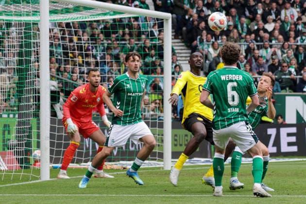 16.05.2026, xgrfx, Fussball 1.Bundesliga, SV Werder Bremen - Borussia Dortmund v.l. Mio Backhaus, Olivier Deman (Werder Bremen), Serhou Guirassy (Borussia Dortmund), Jens Stage (Werder Bremen) (DFL DFB REGULATIONS PROHIBIT ANY USE OF PHOTOGRAPHS as IMAGE SEQUENCES and or QUASI-VIDEO) Bremen