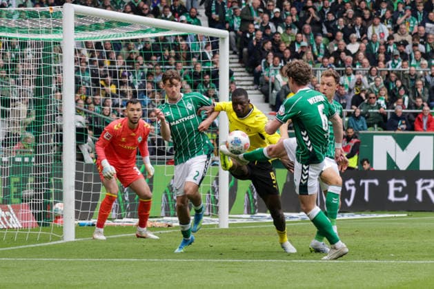 16.05.2026, xgrfx, Fussball 1.Bundesliga, SV Werder Bremen - Borussia Dortmund v.l. Mio Backhaus, Olivier Deman (Werder Bremen), Serhou Guirassy (Borussia Dortmund), Jens Stage (Werder Bremen) (DFL DFB REGULATIONS PROHIBIT ANY USE OF PHOTOGRAPHS as IMAGE SEQUENCES and or QUASI-VIDEO) Bremen