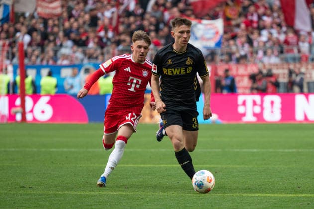 GER, Bayern, Muenchen, Fussball, FC Bayern Muenchen - 1. FC Koeln, in der Allianz Arena, Muenchen, Bundesliga, 34. Spieltag, 16.05.26, v.l. Lennart Karl (FC Bayern Muenchen, 42), Kristoffer Lund (1. FC Koeln, 32), im Zweikampf um den Ball DFL DFB regulations prohibit any use of photographs as image sequences and or quasi-video, Copyright: HMB-Media MichaelxNibel