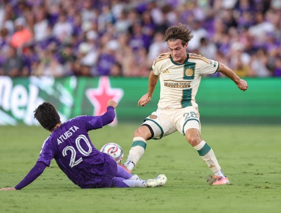 May 16, 2026, U.S.: Atlanta United midfielder WILL REILLY (28) attempts to keep the ball away from a slide tackle by Orlando City SC midfielder EDUARD ATUESTA (20). The Orlando City Soccer Club hosted Atlanta United at Inter&Co Stadium in Orlando, FL. U.S. - ZUMAm299 20260516_znp_m299_009 Copyright: xTaylorxMcFeex