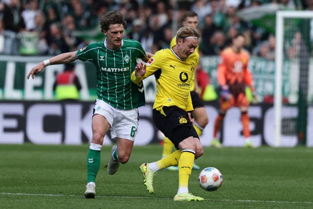 Bremen, Germany, 16.05.26, Jens Stage (Werder Bremen) und Julian Brandt (Borussia Dortmund) im Zweikampf während des Spiels der 1. Bundesliga zwischen Werder Bremen - Borussia Dortmund im Weserstadion in Bremen. (Photo by Joachim Bywaletz) DFB DFL REGULATIONS PROHIBIT ANY USE OF PHOTOGRAPHS AS IMAGE SEQUENCES AND OR QUASI-VIDEO. Copyright: JoachimxBywaletz xJB-Sportfoto