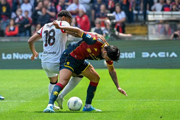 Genoa™s Mikael Ellertsson fights for the ball with Milan™s Nkunku during the Serie A soccer match between Genoa and Milan at the Luigi Ferraris Stadium in Genoa, Italy - Sunday, May 17, 2026. - Soccer .  Copyright: xTanoxPecoraro LaPressex
