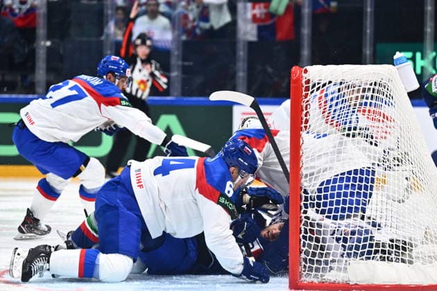 L-R Marek Hrivik (SVK), Patrik Koch (SVK), Cristiano Di Giacomo (ITA) and goalkeeper Adam Gajan (SVK) in action during the 2026 IIHF World Championship, WM, Weltmeisterschaft Group B, match Italy vs Slovakia, on May 17, 2026, Fribourg, Switzerland. (CTKxPhoto RadekxPetrasek) CTKPhotoP2026051703133  CTKPhotoP2026051703133