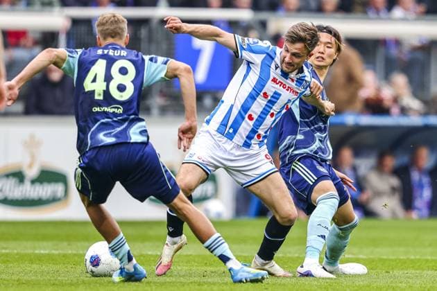HEERENVEEN , 17-05-2026 , Abe Lenstra Stadium , season 2025 2026 , Dutch Eredivisie football , match between SC Heerenveen - Ajax , picture shows Ajax player Sean Steur, SC Heerenveen player Dylan Vente and Ajax player Ko Itakura Heerenveen - Ajax  x203759190x Copyright: