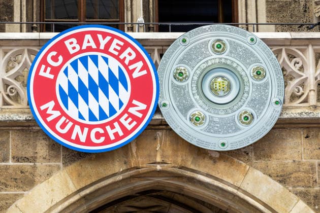 Munich, Bavaria, Germany May 17, 2026: Soccer: FC Bayern Munich™s championship celebration on the City Hall balcony and at Marienplatz in Munich following their victory in the 2025 2026 Bundesliga season. Club logo and image of the championship trophy on the City Hall balcony