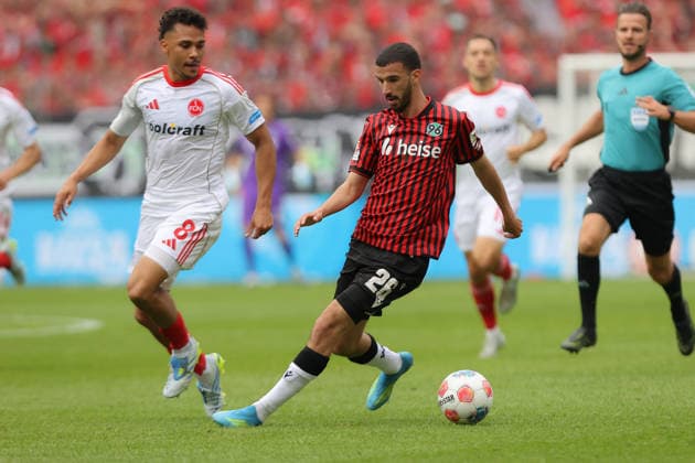 17.05.2026, xtgx, Fussball 2.Bundesliga, Hannover 96 - 1.FC Nürnberg v.l. Henri Koudossou (1.FC Nuernberg) Waniss Taibi (Hannover 96) Zweikampf, Aktion, action, battle for the ball (DFL DFB REGULATIONS PROHIBIT ANY USE OF PHOTOGRAPHS as IMAGE SEQUENCES and or QUASI-VIDEO) Hannover