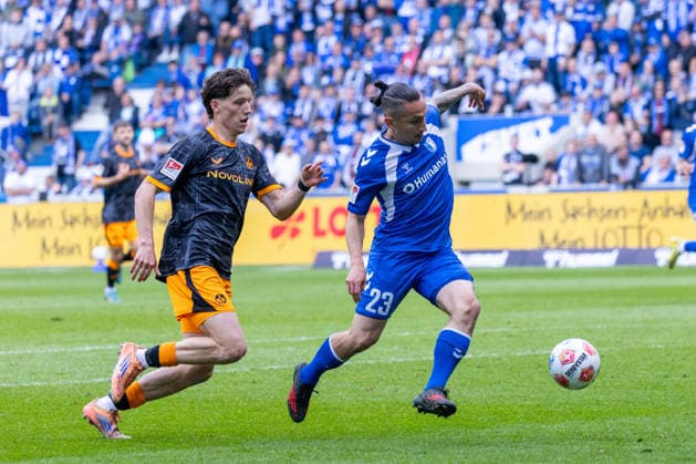 Deutschland: 2.Bundesliga, 34. Spieltag, Saison 2025 2026, 1.FC Magdeburg vs 1. FC Kaiserslautern Avnet Arena (Magdeburg) : Atik Baris (1. FC Magdeburg, 23) im Zweikampf gegen Robinson Leon (1. FC Kaiserslautern, 37)