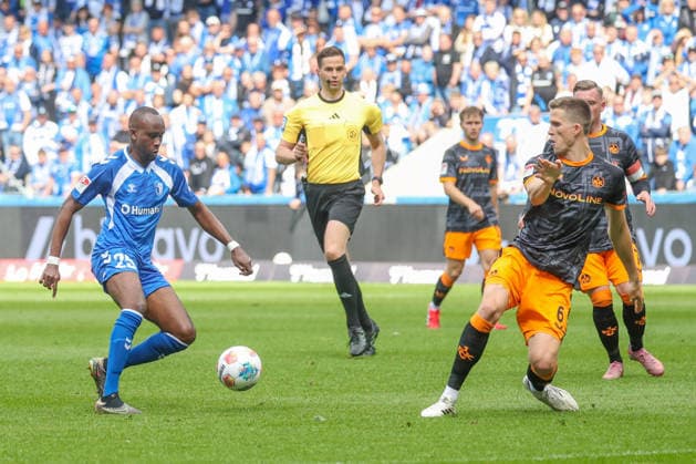 17.05.2026, xgox, Fussball - 2.Bundesliga 1.FC Magdeburg - 1.FC Kaiserslautern emspor, v.l. Silas Gnaka (Magdeburg, 25), Fabian Kunze (Kaiserslautern, 6) Zweikampf, Duell, Kampf, tackle (DFL DFB REGULATIONS PROHIBIT ANY USE OF PHOTOGRAPHS as IMAGE SEQUENCES and or QUASI-VIDEO) Magdeburg