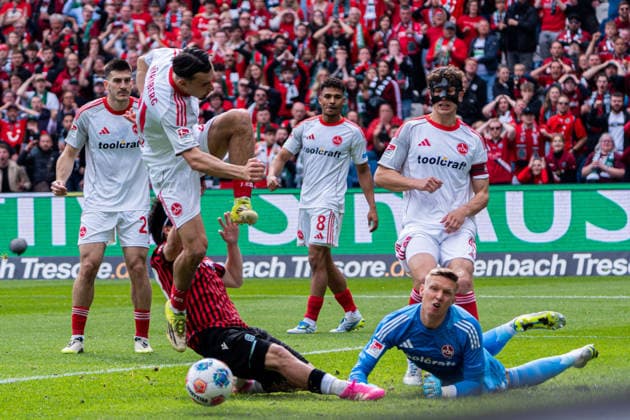 Hannover, Deutschland 17. Mai 2026: 2. BL - 2025 2026 - Sp. 34 - Hannover 96 gegen 1. FC Nürnberg Im Bild: v. li. im Zweikampf Berkay Yilmaz (FCN), Daisuke Yokota (HAN) und Torwart Jan Reichert (FCN) DFL DFB regulations prohibit any use of photographs as image sequences and or quasi-video Heinz von Heiden Arena Niedersachsen