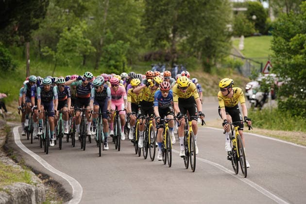 The pack rides with Portugal™s Afonso Oliveira Eulalio of Bahrain Victorious pink jersey during Stage 9 of the Giro d™Italia from Cervia to Corno alle Scale, Italy, Sunday May 17, 2026.  Copyright: xMarcoxAlpozzi LaPressex