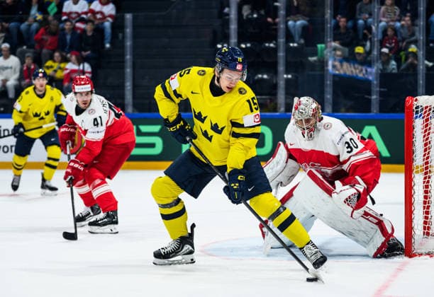 260517 Jack Berglund of Sweden and goaltender Mads Sogaard of Denmark during the 2026 IIHF Ice hockey, Eishockey World Championship, WM, Weltmeisterschaft match between Denmark and Sweden on May 17, 2026 in Fribourg. Photo: Jesper Zerman BILDBYRAN kod JZ JZ0716 ishockey ice hockey ishockey-vm 2026 vm 2026 iihf world championship danmark denmark sverige sweden bbeng Copyright: JESPERxZERMAN BB260517JZ044