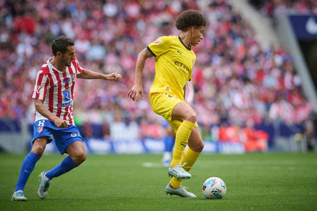 Atletico de Madrid™s Koke Resurreccion (l) and Girona FC™s Axel Witsel during La Liga match. May 17 2026. (20260517011)