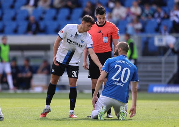 16.05.2026, Fussball 2. Bundesliga, SV Darmstadt 98 - SC Paderborn, v.l., Stefano Marino (SC Paderborn), Aleksandar Vukotic (SV Darmstadt 98) DFL DFB REGULATIONS PROHIBIT ANY USE OF PHOTOGRAPHS AS IMAGE SEQUENCES AND OR QUASI-VIDEO. xdcx