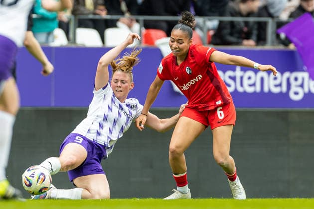 Ramona Maier (SGS Essen) und Nicole Ojukwu Club Freiburg) im Zweikampf waehrend des Spiels der Frauen Fussball Bundesliga zwischen SGS Essen und Sport-Club Freiburg, Stadion an der Hafenstrasse am 17. May 2026 in Essen, Deutschland. (Foto von Mario Hommes DeFodi Images) +++ Ramona Maier (SGS Essen) und Nicole Ojukwu (Sport-Club Freiburg) battle for the ball during the Women s Soccer Bundesliga match between SGS Essen and Sport-Club Freiburg at Stadion an der Hafenstrasse on May 17, 2026 in Essen, Germany. (Photo by Mario Hommes DeFodi Images) DFL regulations prohibit any use of photographs as image sequences and or quasi-video. -