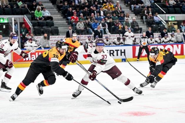 ZURICH, SWITZERLAND - MAY 17: Oskars Lapinskis of Latvia and Fabio Wagner of Germany L) in a battle for the puck during the 2026 IIHF Ice hockey, Eishockey World Championship, WM, Weltmeisterschaft Switzerland game between Germany and Latvia at Swiss Life Arena on May 17, 2026 in Zurich, Zurich. Zurich Swiss Life Arena Zurich Switzerland Copyright: xJustPictures.ch AndreaxBrancax jp-en-EuSpIm-JP7_ANB_Ger_Lat_17052026_7680