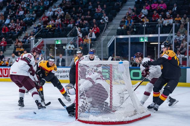 ZURICH, SWITZERLAND - MAY 17: Joshua Samanski (Germany, 44) in the battle for the puck with -95- infant of Kristers Gudlevskis (Latvia, 50) during the Preliminary Round - Group A Match 15 between Germany and Latvia at the IIHF Ice hockey, Eishockey World Championship, WM, Weltmeisterschaft 2026, Swiss Life Arena on May 17, 2026 in Zurich, Switzerland. Zurich Switzerland Copyright: xTimoxSteinx
