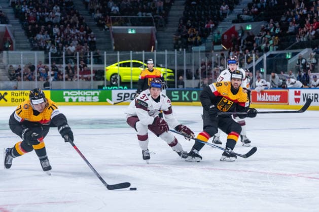 ZURICH, SWITZERLAND - MAY 17: Daniel Fischbuch (Germany, 71) trying to reach the puck during the Preliminary Round - Group A Match 15 between Germany and Latvia at the IIHF Ice hockey, Eishockey World Championship, WM, Weltmeisterschaft 2026, Swiss Life Arena on May 17, 2026 in Zurich, Switzerland. Zurich Switzerland Copyright: xTimoxSteinx