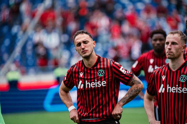 2. Bundesliga: Hannover 96 vs. 1. FC Nürnberg, 17.05.2026 Virgil-Eugen GhiÈ›Äƒ (Hannover 96, 5) hat nach Abpfiff mit den Tränen zu kämpfen; Fußball, 2. Bundesliga, 34. Spieltag: Hannover 96 vs. 1. FC Nürnberg am 17.05.2026 in der Heinz von Heiden Arena, Hannover DFL REGULATIONS PROHIBIT ANY USE OF PHOTOGRAPHS AS IMAGE SEQUENCES AND OR QUASI-VIDEO.