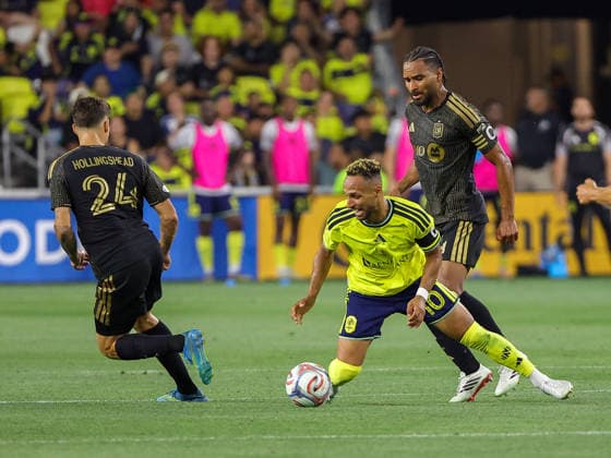 May 17, 2026: Nashville SC midfielder Hany Mukhtar (10) is tripped up by LAFC defender Eddie Segura (4) during a MLS, Fussball Herren, USA match between LAFC and Nashville SC at Geodis Park in Nashville, TN. CSM MLS 2026: LAFC Vs Nashville SC MAY 17  - ZUMAc04_ 20260517_zma_c04_016 Copyright: xStephenxFurstx