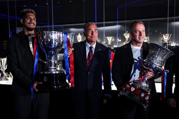May 18, 2026, Barcelona, Barcelona, SPAIN: Ronald Araujo, Hansi Flick and Rafa Yuste, President of FC Barcelona, Barca during ceremony to present the championship trophies won by FC Barcelona in LaLiga EA Sports and the Spanish Super Cup, held at the club s museum on May 18, 2026 in Barcelona, Spain. Barcelona SPAIN - ZUMAa181 20260518_zaa_a181_007 Copyright: xJavierxBorregox