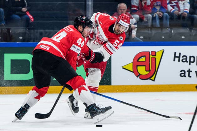 260518 Morgan Rielly of Canada and Felix Scheel of Denmark during the 2026 IIHF Ice hockey, Eishockey World Championship, WM, Weltmeisterschaft match between Canada and Denmark on May 18, 2026 in Fribourg. Photo: Jesper Zerman BILDBYRAN kod JZ JZ0718 ishockey ice hockey ishockey-vm 2026 vm 2026 iihf world championship kanada canada danmark denmark canada kanada bbeng danmark denmark Copyright: JESPERxZERMAN BB260518JZ080
