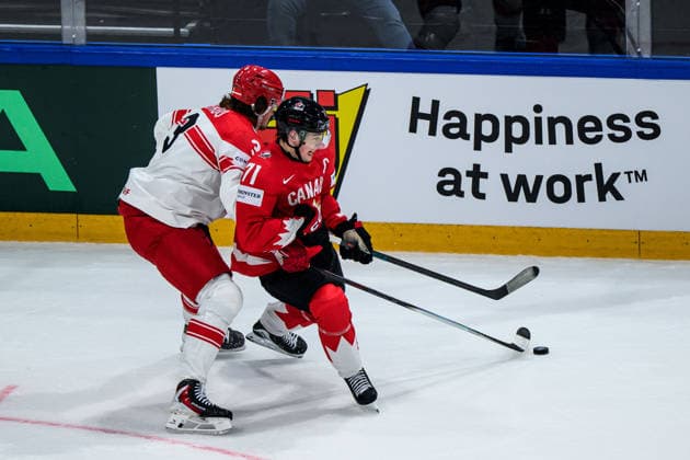 260518 Malte Setkov of Denmark and Macklin Celebrini of Canada during the 2026 IIHF Ice hockey, Eishockey World Championship, WM, Weltmeisterschaft match between Canada and Denmark on May 18, 2026 in Fribourg. Photo: Jesper Zerman BILDBYRAN kod JZ JZ0718 ishockey ice hockey ishockey-vm 2026 vm 2026 iihf world championship kanada canada danmark denmark canada kanada bbeng danmark denmark Copyright: JESPERxZERMAN BB260518JZ084