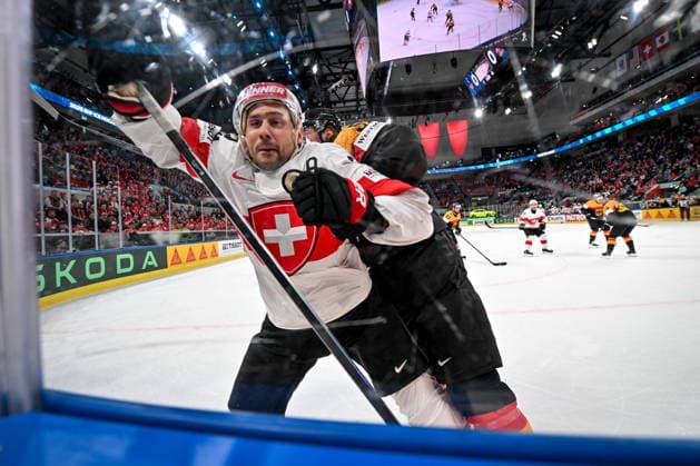 ZURICH, SWITZERLAND - MAY 18: Nino Niederreiter of Switzerland gets hit along the boards during the 2026 IIHF Ice hockey, Eishockey World Championship, WM, Weltmeisterschaft Switzerland game between Germany and Switzerland at Swiss Life Arena on May 18, 2026 in Zurich, Zurich. Zurich Swiss Life Arena Zurich Switzerland Copyright: xJustPictures.ch AndreaxBrancax jp-en-EuSpIm-JP7_ANB_Ger_Sui_18052026_5232