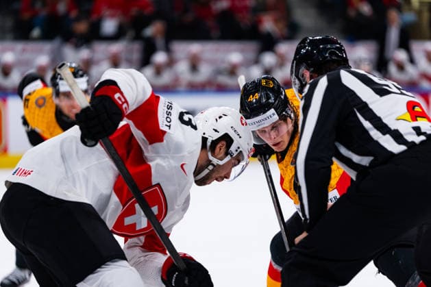 ZURICH, SWITZERLAND - MAY 18: Duel between Joshua Samanski (Germany, 44) and Nico Hischier (Switzerland, 13) during the Preliminary Round - Group A Match 19 between Germany and Switzerland at the IIHF Ice hockey, Eishockey World Championship, WM, Weltmeisterschaft 2026, Swiss Life Arena on May 18, 2026 in Zurich, Switzerland. Zurich Switzerland Copyright: xTimoxSteinx