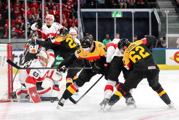 Ice hockey, Eishockey - IIHF WC 2026 ZURICH,SWITZERLAND,18.MAY.26 - ICE HOCKEY - IIHF Ice Hockey World Championship, WM, Weltmeisterschaft 2026, group stage, Germany vs Switzerland. Image shows Leonardo Genoni (SUI), Andreas Eder (GER) and Parker Tuomie (GER).  GEPAxpictures xMaticxKlansek