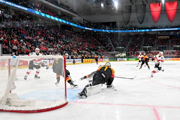 ZURICH, SWITZERLAND - MAY 18: Sven Andrighetto of Switzerland scores a goal against goalkeeper Jonas Stettmer of Germany during the 2026 IIHF Ice hockey, Eishockey World Championship, WM, Weltmeisterschaft Switzerland game between Germany and Switzerland at Swiss Life Arena on May 18, 2026 in Zurich, Zurich. Zurich Swiss Life Arena Zurich Switzerland Copyright: xJustPictures.ch AndreaxBrancax jp-en-EuSpIm-JP7_ANB_Ger_Sui_18052026_5397