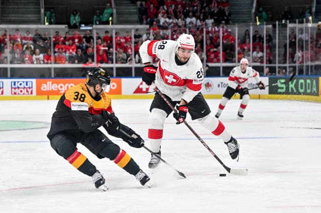 ZURICH, SWITZERLAND - MAY 18: Timo Meier of Switzerland in action against Fabio Wagner of Germany during the 2026 IIHF Ice hockey, Eishockey World Championship, WM, Weltmeisterschaft Switzerland game between Germany and Switzerland at Swiss Life Arena on May 18, 2026 in Zurich, Zurich. Zurich Swiss Life Arena Zurich Switzerland Copyright: xJustPictures.ch AndreaxBrancax jp-en-EuSpIm-JP7_ANB_Ger_Sui_18052026_1832