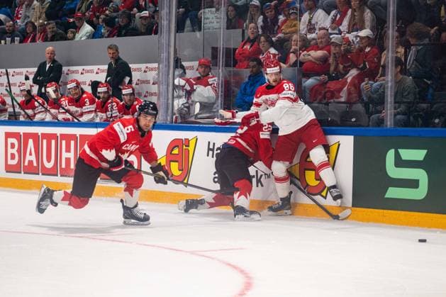 FRIBOURG, FRIBOURG - MAY 18: Denton Mateychuk and Evan Bouchard of Canada battle with Joachim Blichfeld of Denmark during the 2026 IIHF World Championship, WM, Weltmeisterschaft Preliminary Round Group B match between Canada and Denmark at BCF Arena on May 18, 2026 in Fribourg, Fribourg, Switzerland. Copyright: xLivioxBaeriswylx xSPPx Sportspressphoto_SPR149918