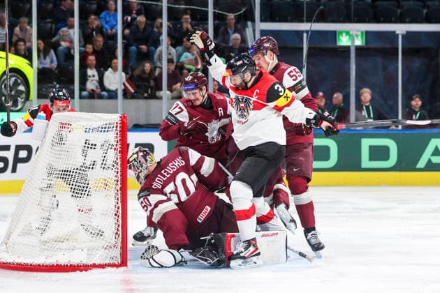Ice hockey, Eishockey - IIHF WC 2026 ZURICH,SWITZERLAND,19.MAY.26 - ICE HOCKEY - IIHF Ice Hockey World Championship, WM, Weltmeisterschaft 2026, group stage, Austria vs Latvia. Image shows Kristers Gudlevskis, Kristaps Zile (LAT), Peter Schneider (AUT) and Roberts Mamcics (LAT).  GEPAxpictures xMaticxKlansek