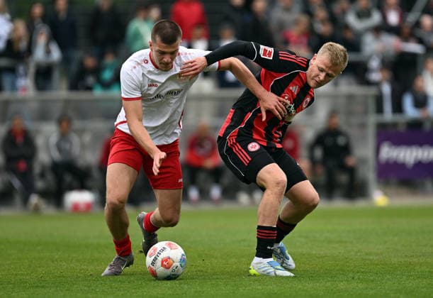 19.05.2026, xjhx, Fussball Testspiel, RW Frankfurt - Eintracht Frankfurt v.l. Jovan Petkovic (RW Frankfurt), Jonathan Jonny Burkardt (Eintracht Frankfurt) (DFL DFB REGULATIONS PROHIBIT ANY USE OF PHOTOGRAPHS as IMAGE SEQUENCES and or QUASI-VIDEO) Frankfurt am Main
