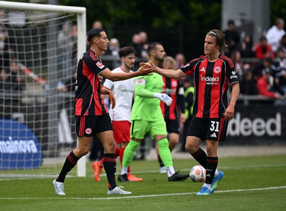 19.05.2026, xjhx, Fussball Testspiel, RW Frankfurt - Eintracht Frankfurt v.l. Younes Ebnoutalib (Eintracht Frankfurt) , Love Arrhov (Eintracht Frankfurt) celebrate the goal, Der Torjubel zum 1:0 (DFL DFB REGULATIONS PROHIBIT ANY USE OF PHOTOGRAPHS as IMAGE SEQUENCES and or QUASI-VIDEO) Frankfurt am Main