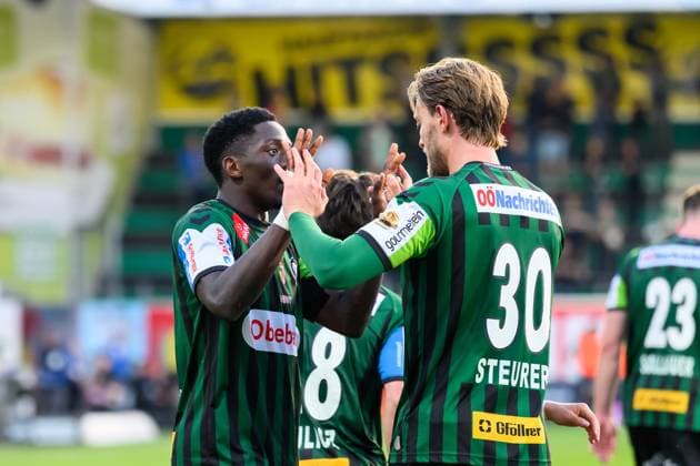 SOCCER - BL, Ried vs WAC RIED,AUSTRIA,19.MAY.26 - SOCCER - ADMIRAL Bundesliga, Europacup play off, SV Ried vs Wolfsberger AC. Image shows the rejoicing of Kingstone Mutandwa and Oliver Steurer (Ried).  GEPAxpictures xDanielaxMoser