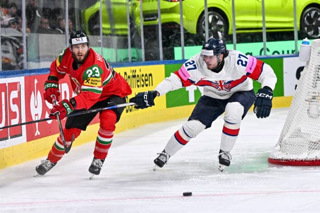 ZURICH, SWITZERLAND - MAY 19: Zeteny Hadobas of Hungary and Cole Shudra of Great Britain in a battle for the puck during the 2026 IIHF Ice hockey, Eishockey World Championship, WM, Weltmeisterschaft Switzerland game between Hungary and Great Britain at Swiss Life Arena on May 19, 2026 in Zurich, Zurich. Zurich Swiss Life Arena Zurich Switzerland Copyright: xJustPictures.ch AndreaxBrancax jp-en-EuSpIm-JP7_ANB_Lat_Aut_19052026_5247