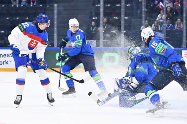 L-R Kristian Pospisil (SVK), Jan Golicic (SLO), goalkeeper Lukas Horak (SLO) and Blaz Gregorc (SLO) in action during the 2026 IIHF World Championship, WM, Weltmeisterschaft Group B, match Slovenia vs Slovakia, Fribourg, Switzerland, on May 19, 2026. (CTKxPhoto RadekxPetrasek) CTKPhotoP2026051908808  CTKPhotoP2026051908808