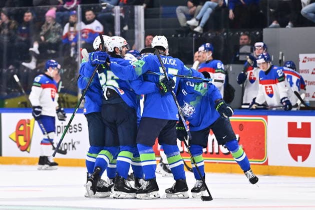 Slovenian players celebrate the fourth goal in the 2026 IIHF World Championship, WM, Weltmeisterschaft Group B, match Slovenia vs Slovakia, Fribourg, Switzerland, on May 19, 2026. (CTKxPhoto RadekxPetrasek) CTKPhotoP2026051909750  CTKPhotoP2026051909750