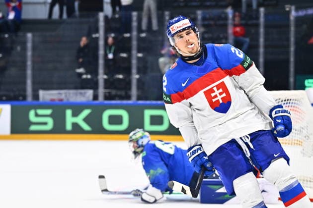 R-L Kristian Pospisil (SVK) and goalkeeper Lukas Horak (SLO) in action during the 2026 IIHF World Championship, WM, Weltmeisterschaft Group B, match Slovenia vs Slovakia, Fribourg, Switzerland, on May 19, 2026. (CTKxPhoto RadekxPetrasek) CTKPhotoP2026051909873  CTKPhotoP2026051909873