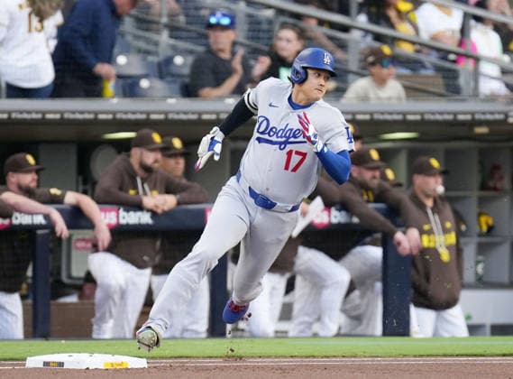 Baseball: Dodgers vs. Padres Los Angeles Dodgers designated hitter Shohei Ohtani rounds first base after hitting a double in the first inning of a baseball game against the San Diego Padres at Petco Park in San Diego, California, on May 19, 2026.  A14AA0005586722P