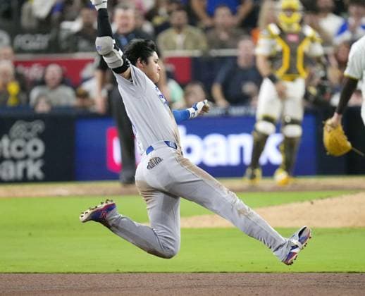 Baseball: Dodgers vs. Padres Los Angeles Dodgers designated hitter Shohei Ohtani slides to second base after hitting a double during the eighth inning of a baseball game against the San Diego Padres at Petco Park in San Diego, California, on May 19, 2026.  A14AA0005587261P
