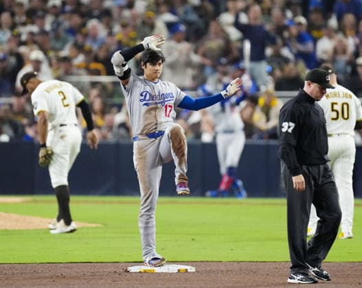 Baseball: Dodgers vs. Padres Los Angeles Dodgers designated hitter Shohei Ohtani strikes a pose after hitting a double during the eighth inning of a baseball game against the San Diego Padres at Petco Park in San Diego, California, on May 19, 2026.  A14AA0005587321P