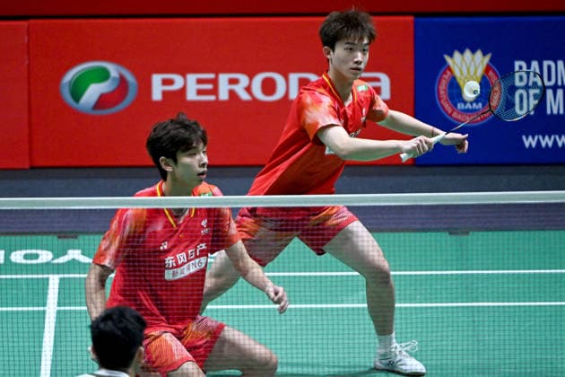 (260520) -- KUALA LUMPUR, May 20, 2026 -- Hu Keyuan Lin Xiangyi (L) compete during the men s doubles round of 32 match between Hu Keyuan Lin Xiangyi of China and Leo Rolly Carnando Daniel Marthin of Indonesia at 2026 Malaysia Masters badminton tournament in Kuala Lumpur, Malaysia, May 20, 2026. (Photo by Xinhua) (SP)MALAYSIA-KUALA LUMPUR-BADMINTON-MALAYSIA MASTERS-MEN S DOUBLES ChongxVoonxChun 