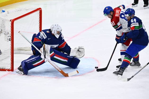 L-R Goalkeeper Damian Clara (ITA), Matej Blumel (CZE) and Gregorio Gios (ITA) in action during the 2026 IIHF World Championship, WM, Weltmeisterschaft Group B, match Czechia vs Italy, Fribourg, Switzerland, on May 20, 2026. (CTKxPhoto RadekxPetrasek) CTKPhotoP2026052007884  CTKPhotoP2026052007884